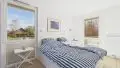 Schlafzimmer mit Ausgang zum Balkon