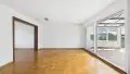 Wohnzimmer mit Zugang zum Wintergarten