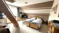 Schlafzimmer im Obergeschoss mit Galerie
