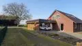 geplasterte Auffahrt, Doppelcarport