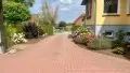 gepflasterte Zuwegung