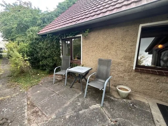 Sitzbereichvor dem Haus